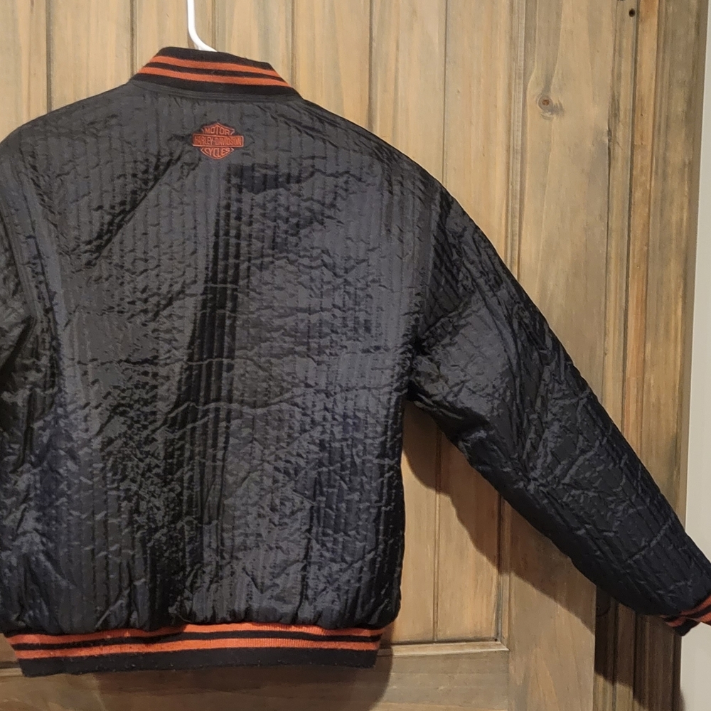 Womans size LG reversible quilted Harley jacket